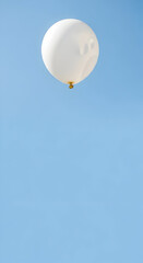 Balloon Floating in a Bright Blue Sky Upward View