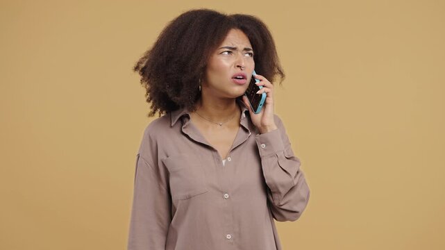 Annoyed Young African Woman Quarreling Talking On Mobile Phone. Angry Lady 