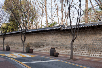 Deoksugung Stonewall Walkway in winter. It is the pedestrian footpath that runs next to Deoksugung Palace in Seoul, South Korea