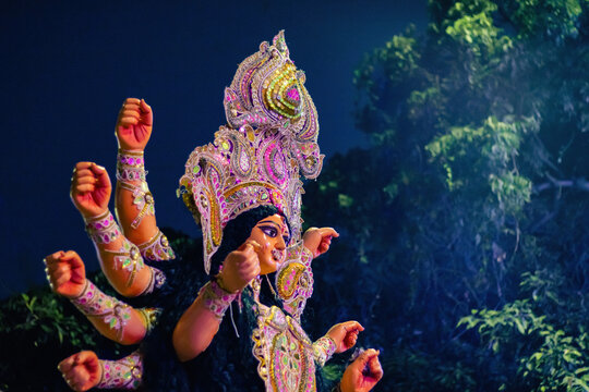 Durga puja with idol of goddess Durga during festival celebration. Idol being transported for visarjan ceremony during vijaya dashami or dussehra