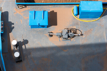 The deck of a boat carrying sand toi be processed