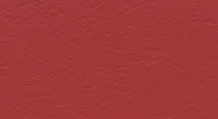 Fototapeta premium A textured red wall with a subtle plaster finish.