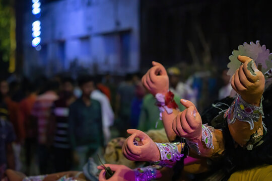 Durga Puja with idol of goddess Durga being transported for festival during vijaya dashami for visarjan or immersion.