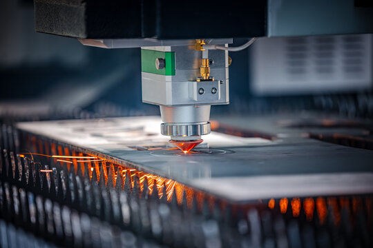 CNC Laser cutting of metal, modern industrial technology.