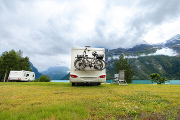 Family vacation travel RV, holiday trip in motorhome, Caravan car Vacation. Beautiful Nature Norway.