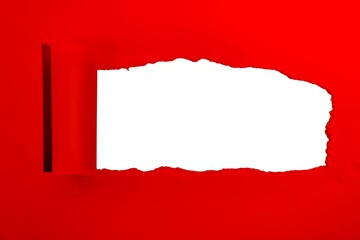 Red torn paper revealing white space.