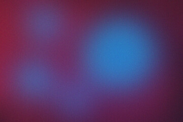 Abstract background with blurred magenta and blue light spots and grainy texture image photo