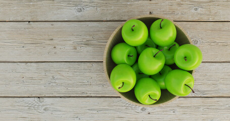 Wooden Bowl With Green Apples On Rustic Planks