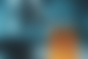 Abstract Blend of Teal Blue and Warm Orange Hues with Grainy Texture background blur