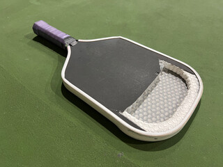 Inside a Pickleball paddle showing the honeycomb composition with a foam boarder