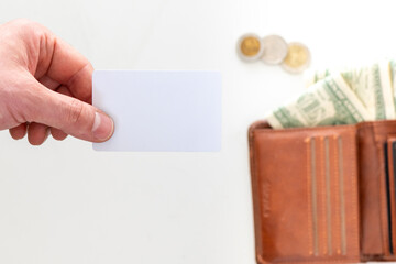 blank credit card with wallet, cash and coins on background