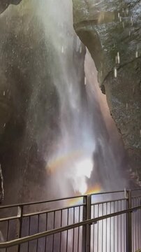 Mighty Cascata Varone waterfall in Italy, crashing down inside a rocky gorge. Water spray fills the air, echoing thunder and creating an overwhelming sense of raw natural power
