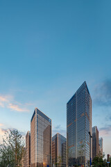 Modern skyscrapers under a clear blue sky in an urban area