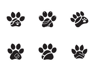 Fototapeta premium Collection of Unique Paw Print Illustrations in Black and White for Animal and Pet Themed Designs and Graphics