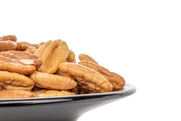 Peeled pecan nuts isolated on white background, close-up.