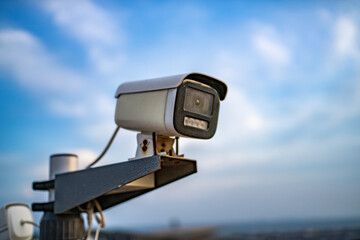 Outdoor surveillance camera monitoring the surroundings