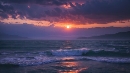 Sunset over the ocean with mountains in the background and clouds in the sky. Nature scene with water and atmospheric conditions.