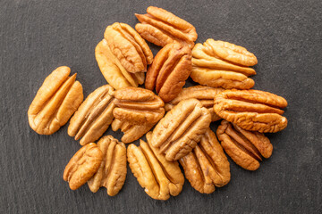 Shelled pecan nuts, top view, macro.