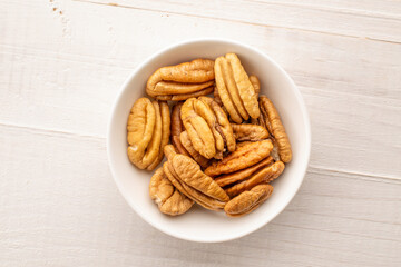 Shelled pecan nuts, top view, macro.