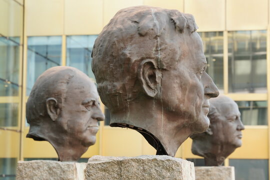 Fathers of Unity: Busts of American President George H. W. Bush, German Chancellor Helmut Kohl, and Soviet leader Mikhail Gorbatschow in front of the Axel Springer building, Berlin, Germany