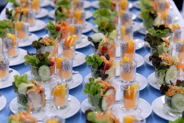 line of many dish of the set of cocktail salad shot dessert in dinner reception