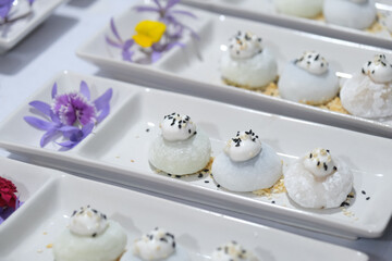 mochi sack dishes with decoration at dinner reception
