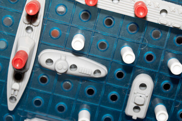 Close up of strategic battleships board game with ships and pegs