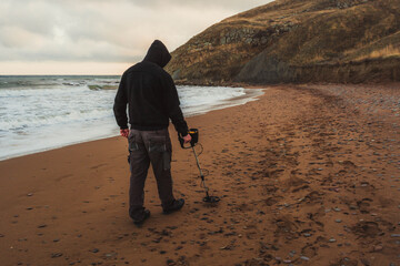 Man with a metal detector
