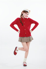 Happy Asian Woman in Festive Outfit Christmas Model Announcing Celebration and Sale and Discount. Holiday Promotion and Party.