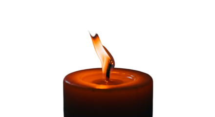 A solitary candle flame dances against the dark a beacon of hope memory and peace in silent contemplation with a focus
