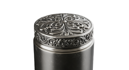 An ornate silver container holds secrets and stories a treasure of time etched with delicate floral details against a