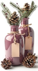 Two mauve-colored glass bottles, adorned with pine cones and sprigs,  display blank tags
