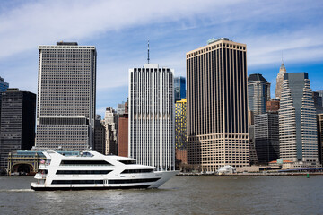 Zephyr Sightseeing Boat Cruising Along Lower Manhattan’s Waterfront on a Clear Day