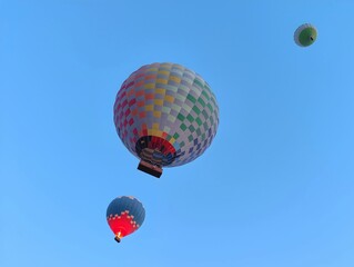 Beautiful colorful hot air balloons photo image flying in blue clear sky bottom view over amazing valleys in Pamukkale Turkey high resolution hd wallpaper perfect for campaigns