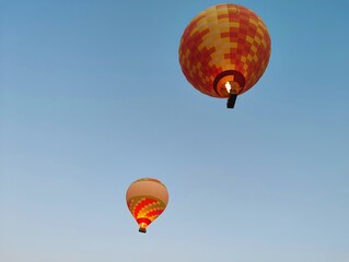 Beautiful colorful hot air balloons photo image flying in blue purple pink clear sky bottom view over amazing valleys in Pamukkale Turkey high resolution hd wallpaper perfect for campaigns