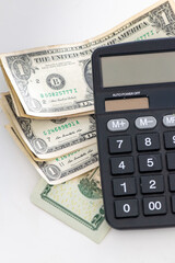 Calculator with Dollar Banknotes