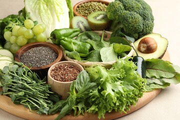 Superfood. Different healthy products on beige background, closeup