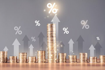 Percent signs, arrows and stacked coins against grey background