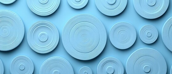 Serene Panorama of Light Blue Medallions with Fine Concentric Groove Textures