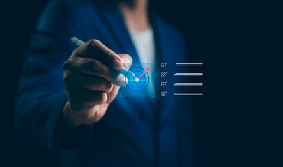 Businessman select target goals strategic for business purpose, goal achievement and futuristic innovation for strategic planning. Strategic planning for business target concept.