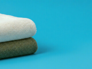  towels on a blue background