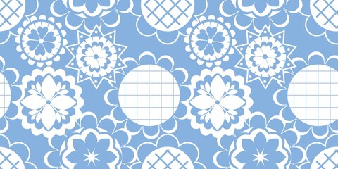 Blue white seamless background with flowers.
Abstract, repeating regular pattern for print.
Graphic design with regular shapes.
