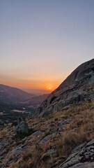 reddish sunset in the mountains red sun