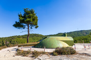 Historic artillery gun at Turgut Reis Bastion surrounded by nature in &Ccedil;anakkale, Turkey