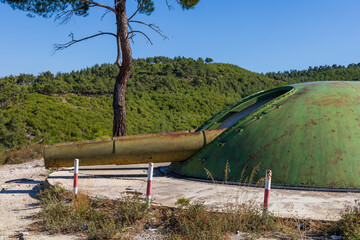 Historic artillery gun at Turgut Reis Bastion surrounded by nature in &Ccedil;anakkale, Turkey