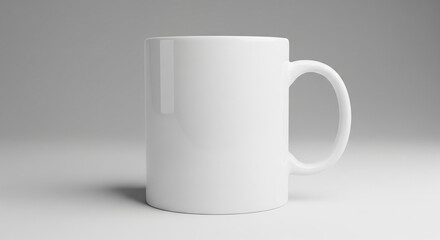 Fototapeta premium A pristine white ceramic coffee mug with a handle, standing on a reflective surface against a soft grey background.