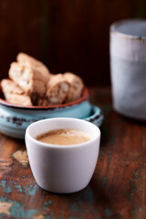 Cup of coffee on rustic wooden background. Soft focus. Copy space	