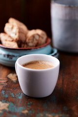 Cup of coffee on rustic wooden background. Soft focus. Copy space	