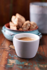 Cup of coffee on rustic wooden background. Soft focus. Copy space	