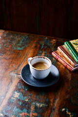 Cup of coffee on rustic wooden background. Soft focus. Copy space	